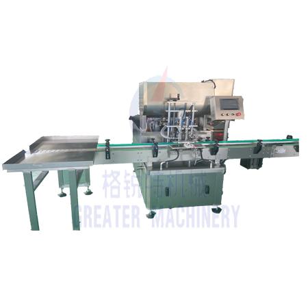 全(quan)自動(dong)雙(shuang)頭(tou)醬(jiang)料(liao)灌裝機(ji)