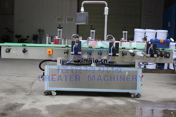 塗料桶(tong)自(zi)動(dong)貼(tie)標機