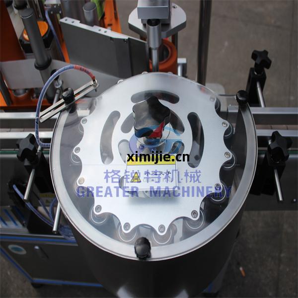 油漆(qi)罐(guan)貼(tie)標(biao)機(ji)